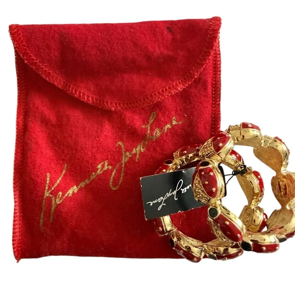 Kenneth Jay Lane Red and Gold napkins  Holders rings